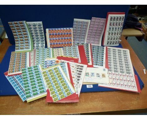 A quantity of whole sheets of mint pre-decimal postage Stamps, a First Day Cover, a 17p faulty stamp on envelope, some part s