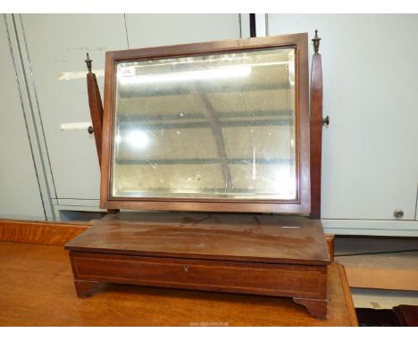 A Mahogany framed Swing Mirror having light and darkwood stringing and raised on an olive velvet type fabric lined locker bas