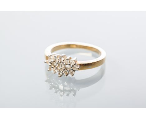 DIAMOND CLUSTER RING
set with a cluster of baguette and brilliant cut diamonds, marked 750 for eighteen carat gold, size M