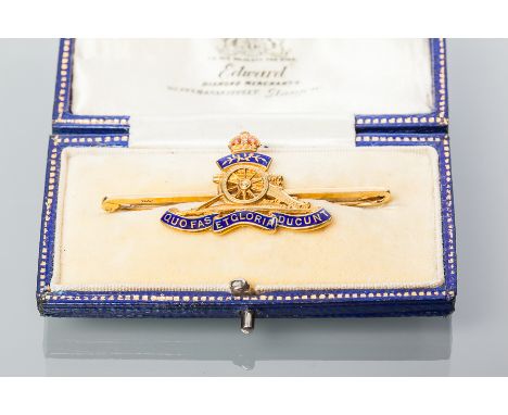 FIFTEEN CARAT GOLD MILITARY ROYAL ARTILLERY BAR BROOCH
enamel detail to motto, marked 15ct for fifteen carat gold, 52mm long