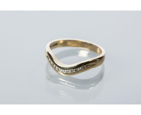 DIAMOND SET WEDDING BAND
channel set with brilliant cut diamonds, hallmarked for nine carat gold, size K