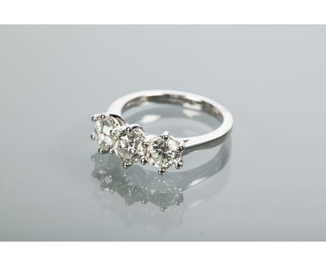 CERTIFICATED DIAMOND THREE STONE RING
the three brilliant cut diamonds totalling 2.3 carats, in platinum, size M-N, the certi