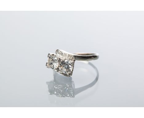 DIAMOND TWO STONE RING
the two brilliant cut diamonds each approximately 0.50 carats, in square settings, of twist design wit