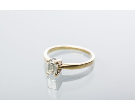 DIAMOND SOLITAIRE RING
the emerald cut diamond approximately 0.65 carats, in eighteen carat gold, size L-M