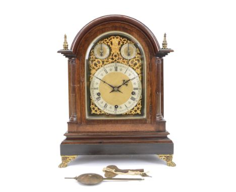 Winterhalder and Hoffmeier - German 8-day three train Edwardian oak cased mantle clock, with a break arch pediment, brass sou