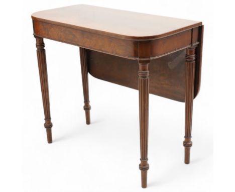 Late Regency mahogany side table, drop-leaf rectangular top with rounded corners, figured frieze rails over Gillow's type tur