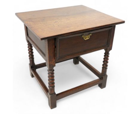 18th century oak side table, rectangular top over single drawer, the drawer front with applied mouldings and engraved shaped 