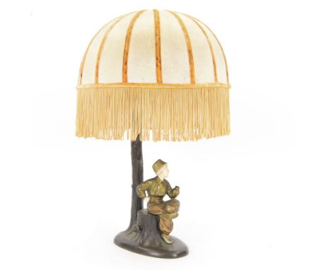 Professor Otto Poertzel (German, 1876-1963): gilt bronze and carved ivory figure, circa 1920-1930, modelled as a young dutch 