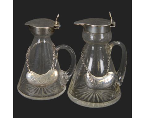 Pair of early/mid 20th century silver mounted glass whiskey noggins, each of tapering cylindrical form with hinged flat cover