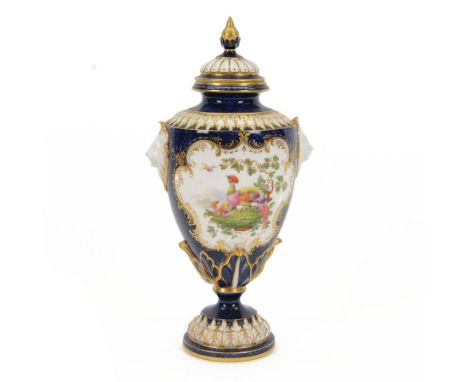 Late 19th century Royal Worcester porcelain vase and cover, circa 1897, of baluster form with twin lion masks to shoulders, p