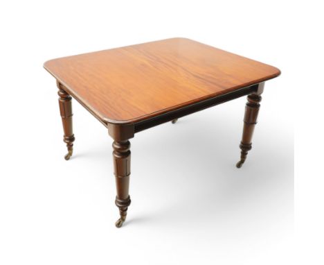 Victorian mahogany extending dining table, moulded rectangular top with rounded corners, pull-out action with additional leaf