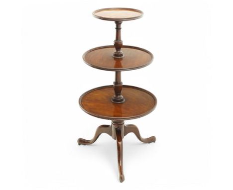 George III mahogany dumb waiter, three graduating circular tiers with moulded edges, turned column supports on tripod base, o