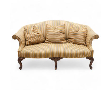 Chippendale design hardwood-framed settee, arched back over rolled arms and serpentine seat, upholstered in striped fabric, o