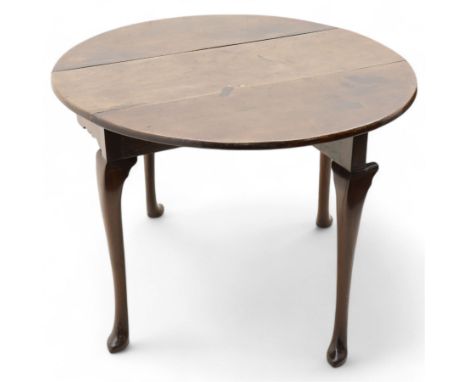 George III mahogany dining table, oval drop-leaf top on gate-leg action base, on cabriole supports with pointed pad feetDimen