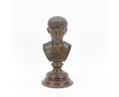 After the Antique, mid/late 19th century bronze portrait bust of a young Julius Caesar, upon a bronze waisted socle, signed L