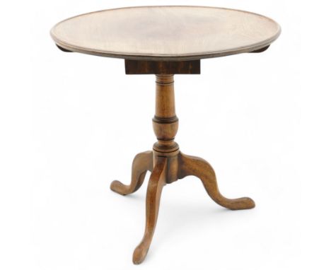 George III mahogany tripod table, circular dished tilt-top with moulded edge on cage action, baluster turned pedestal with th