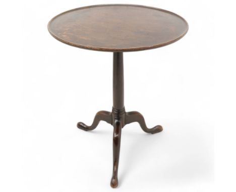 George III mahogany tripod table, circular dished tilt-top with moulded edge, narrow gun barrel stem on three out-splayed sup