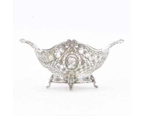 Late 19th/early 20th century German Hanau silver basket, modelled in George II style, of shaped openwork lattice form with tw
