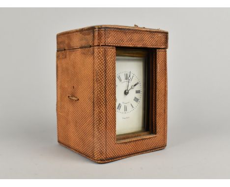 An Edwardian French Brass Cased Carriage Clock Retailed by Finnigans, Movement In Need of Minor Attention, 14cms High
