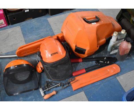 A Stihl Petrol Chainsaw with Helmets, Hard Carrying Case, Accessories Etc