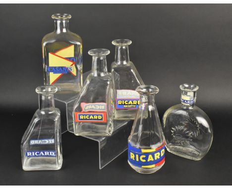 A Collection of French Glass Carafe Bottles to Comprise Ricard and Casanis