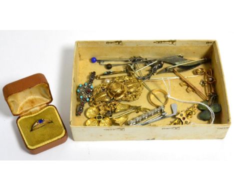 A group of jewellery to include a 9 carat gold spaniel bar brooch, a David Anderson enamel brooch, a citrine stick pin, a 9 c