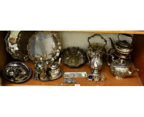 A silver teapot, Sheffield; a silver teapot, Birmingham; an Indian silver buckle; a group of silver plate including two salve
