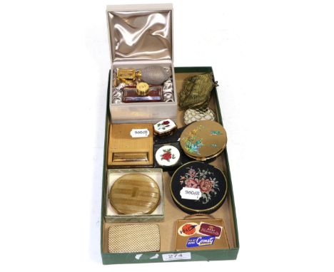 A Christian Dior perfume set; mesh purse; and a quantity of compacts and pill boxes 