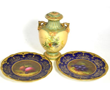 A pair of Coalport porcelain plates, painted with fruit, signed F Howard (one a.f.) and a Royal Worcester twin handled vase a