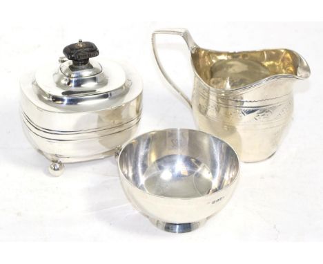 A small silver tea caddy, Sheffield 1906; a plain silver bowl, London 1919; and a George III silver cream jug with rubbed mar