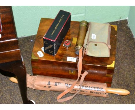 Writing slope, 'Isobel' rolling pin, Brownie no.2 folding camera and a brass telescope 