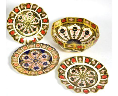 A Royal Crown Derby octagonal bowl and three Royal Crown Derby Imari plates Bowl a second and with some paint scratches to in