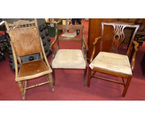 A 19th century mahogany barback scroll elbow chair; together with a 19th century mahogany Chippendale style elbow chair; and 