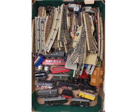 A tray containing a collection of Marklin HO scale locomotives together with a selection of track and signals