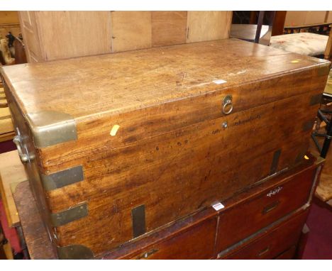 A late 19th century mahogany and brass bound campaign hinge topped travelling trunk, having brass end carry handles, 92 x 39 