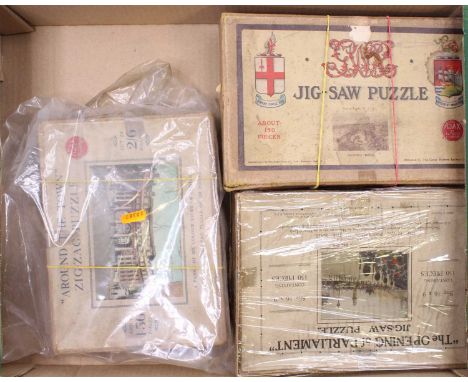 A collection of railway interest puzzles and stamp albums, to include Swansea Docks by Chad Valley Puzzle Company