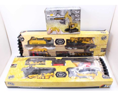 A collection of Caterpillar and earth moving related toys &amp; collectables to include a construction express train, and a r