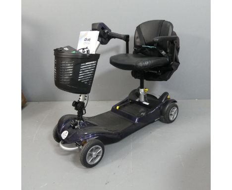 A Drive Astrolite  lightweight mobility scooter, with instruction manual and charging cable. In good working order.