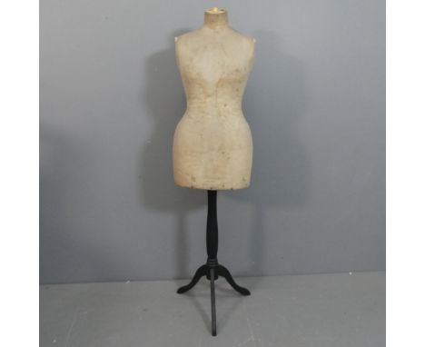 A French shop display mannequin on stand, marked for Stockman. Height 150cm.