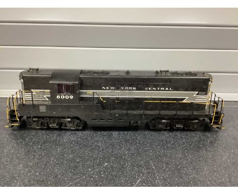 An 0 gauge Korean-made New York Central Highnose GP9 diesel locomotive no.6009, playworn (some parts of handrails detached) a