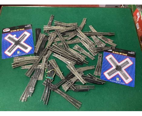 Approximately forty-three N gauge points by Fleischmann and Peco, most appearing used, together with four diamond crossings.