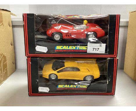 Two Scalextric 1:32 Scale Slot Cars. Comprising of C.288 Aston Martin DBR 1/300 (Red), C.127 Lamborghini Diablo. Damage/Crush