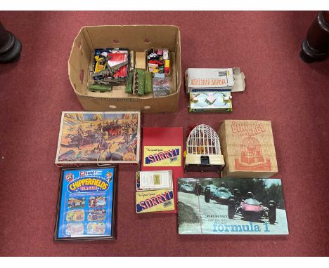 A Miscellaneous Collection of Toys and Games to include The Bird In A Cage wind up toy, boxed. A 1950's Wild &amp; Woolly Cow