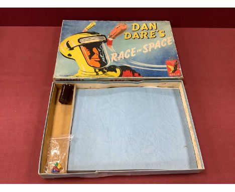 A 1950s Eagle 'Dan Dare Race In Space Game', by Chad Valley, appears complete with correct counters, boxed, some tape repairs