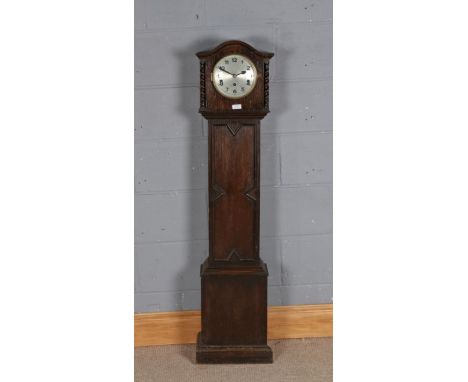 1930's oak granddaughter clock, having silvered dial with arabic numerals, flanked by barley twist columns either side, geome