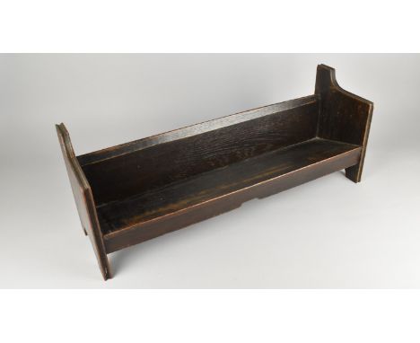 An Edwardian Oak Book Trough, 64cms Wide