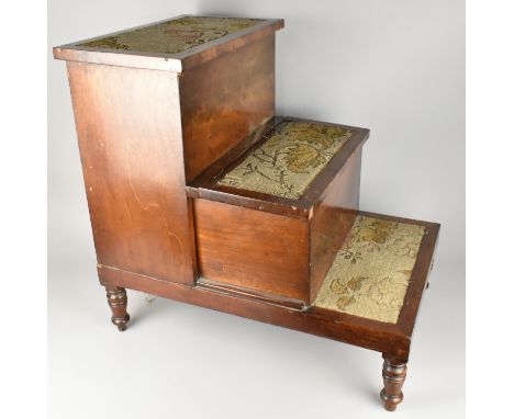 A Victorian Mahogany Bed Step Commode with Patterned Carpet Treads, the Top Hinged Step Revealing Storage Well and the Middle