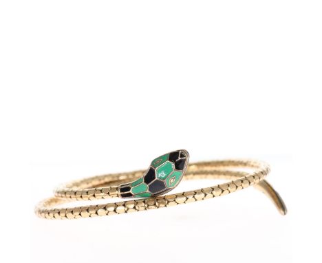 Rolled gold snake wrap bangle with enamel head. Measures approx. 7cm. Some wear to the plating. This bangle weighs in total 1