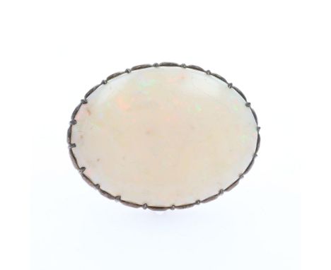 Antique oval cabochon cut Opal brooch. Measures approx. 3 x 1.2cm. Weighs in total 6.4g