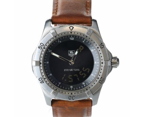 Tag Heuer - 2000 Series Ana-Digi 200m Professional Steel Quartz Watch. Tag Heuer ETA Cal. 988.432 quartz movement. Stainless 